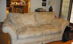 Lane,Gray microfiber couch and oversized chair with storage ottoman. No stains, NO tears. Super Comfy!!
Matching pillows also available if wanted.