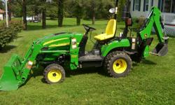 Utility tractor with front loader and backhoe.&nbsp; 3 years old, Only 64 hours. &nbsp;e-mail rex3264@verizon.net or phone --