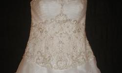 lOWERING WEDDING DRESS BY $200.00 4 BRIDESMAIDS DRESSES, ALL "LOVE " THEME DECOR INCLUDING CANDLES AND VOTIVES, SIZE 7 SHOES ALL FOR $500.00 Beautiful A-Line waist Brand New Ivory Wedding Dress. Never worn or altered. It is a Wedding Dress Size=12.