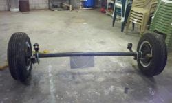 New Single Trailer Axle with Electric brakes, 3500 lb.&nbsp;leaf springs, Two new tires plus a spare. Price is neg.