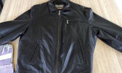 THIS JACKET IS A SIZE : LARGE (NEVER BEEN WORN) BLACK LEATHER JACKET WITH NO MARKS OR SCRATCHES ANYWHERE ON IT. BRAND NEW LIKE IT JUST CAME OUT OF THE STORE!
IT HAS 2 OUTSIDE DEEP POCKETS AND 1 CHEST POCKET.
IT HAS A DEEP INSIDE POCKET WITH A COSTUME CELL