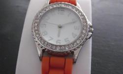 Never worn orange rubber watch. Only $7, plus any mailing costs.&nbsp;