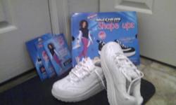 New in box, womens Skechers Sport Shoes. White, Size 9. Will ship anywhere in US.