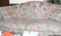 I am moving to a smaller place and no longer have room for this set. The sofa is 6' long and flowered. The matching chair and ottoman are a plaid in matching colors and feet. The pillows come with the sofa. This is a very comfortable set. I live on the
