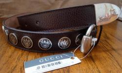 Gucci Hysteria Vernis dark brown genuine leather (calf) and stainless steel buckle and end with Hysteria logo studs is 100% Authentic and brand new.
This ladies chic belt is ideal with jeans. It has a store tag attached (bought in Dubai) and a dust bag.