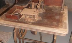 old sewing machine in wooden case