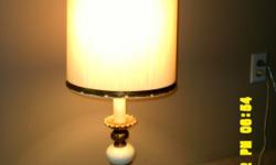 A matching pair of beautiful lamps giving a mellow light to bedroom or living room.&nbsp;