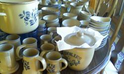 203 peices. Five different plate sizes 8-12 of each. Five different styles and sizes of bowls, 8-12 of each. Mugs, Tankards, mixing bowls, pitchers, glases, platters, pasta bowls, cookie jar, baking dishes, large soup terrine, casserole dishes, large
