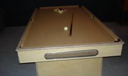 Pool Table with all the accesories. Tan felt measuring 84 in. by 44 in. Smaller size, cheap fun for the kids!!