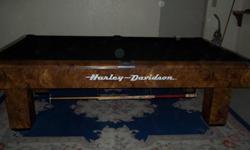gandy table with harley davidson on the side,u get three set of balls,chalk,chalk holder,15 cues ,harley davidson pool cue holder,,harley davidson table brush, cover for table,harley figurines,harley ball rack, harley davidson dart board, all for 800.00