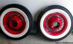 I have (2) 1935 Ford 16x4 original Wire wheels with New Coker WW Radial tires. These also have the hub re-inforcement rings and chrome center caps. These were sandblasted, then powdercoated bright red. These are great for the fronts. Tire size is 5.50-R16