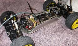 kyosho inferno all wheel drive nitro rc has escalade body engine tired but all other functions great comes with hundreds of dollars in extras xtras 12v starter 3 set tires ect trade for fast electric car or cash offer