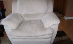 Dual reclining couch and reclining chair set. Creme color, scotch guarded, very comfortable and in excellent condition.