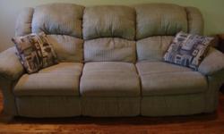Reclining love seat with center console (2 recliners), sofa with two recliners and pillows.
Excellent condition, green in color. Selling the set. Must pick up furniture.