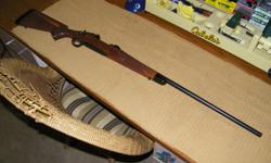 Remington 700 Classic Deluxe in 300 Remington Ultra Magnum. Very nice rifle, has 26 inch barrel with walnut stock. Stock has been glass bedded and trigger lightened to around 3 pounds. Comes with Leupold bases, a few boxes of ammo, and a reloading die.