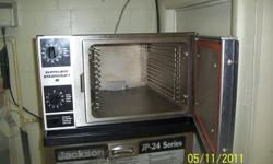 Cleveland Steamcraft, Electric (220) and water line hook-up. Holds 3 full size pans at a time, works great