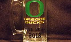 Oregon Ducks 24oz 2012 Commemorative Remember your favorite team from Rose Bowl 2012 with a 25oz Sports Mug.
Deep rich 'carvings' which are then painted with your teams favorite colors. Your name can be personalized on the back.
These are hand carved, not