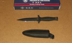 This S&W Boot Knife is 9 inches long over all, and has a 4 1/2 inch blade.