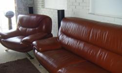selling a sofa that is made out of leather it is brown and long