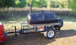 THIS IS A CUSTOM BUILT TOW BEHIND SMOKER. IT HAS 2 SLOTTED 3IN TUBES END TOEND FOR HEAT DISTRIBUTION, IT COOKS GREAT. HAS GRANITE TABLE, WOOD BOX,SLIDE OUT UPPER GRILL CUSTOM WHEELS. I CUSTON BUILD ANY TYPE OF SMOKER/GAS GRILL HAVE MANY TO CHOOSE