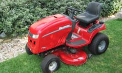 SNAPPER- 23 HP Briggs & Stratton Extended Life OHV Engine - Hydrostatic Drive - 42" Mowing Deck purchased 6/2009 Mower showroom new in garage, still glossy with nubs on the tires because it hasn't been used enough to wear them down. It was used maybe 12
