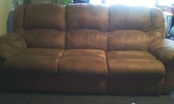 Sofa has recliners on both ends, massage built in and center folds down with drink holders. love seat rocks and reclines. Paid $1800 asking $600 or best offer. Call or txt 717-645-1387.