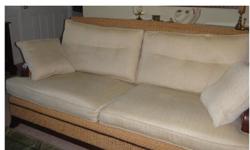 80" Oceanside sofa from Haverty's Furniture, purchased 10/2008 fo $1499. Good condition. Cushions are cornsilk colored tan herringbone fabric: 2 seat cushions, 2 back cusions, 2 throw cushions with an extra set of covers for the seat cushions. The frame