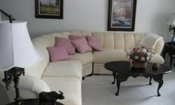 3 pc white sectional sofa very good condition. $600.00. phone 732-2153