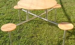 This Stainless and Bamboo Patio/Picnic table is elegant,durable,handicap accessible and excellent for any outdoor areas. It comes boxed and is easy to assemble.
