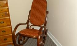 very nice standard size rocking chair.with velvet cover seat and back rest.