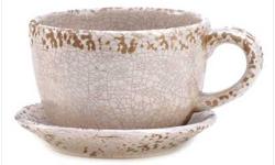 13881 TEATIME DELIGHT PLANTER Perk up your favorite foliage when you place it into this playful planter!
Charming cup-and-saucer theme adds a hint of gracious good looks to your indoor or outdoor living space.
Saucer attached to the cup.
Weight 3.2 lbs