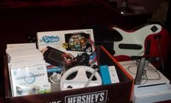 THE WII GAME AND 15 GAMES. HAS 2 CONTROLS,THE &nbsp;WHEEL CONTROL,2 MIKES, AND THE WII DRAW, AND THE
GUITAR.. AROUND 800.00 OF STUFF. SELLING FOR 325.00 WORKS GREAT. AM IN FAYETTEVILLE AR. &nbsp;
&nbsp;--