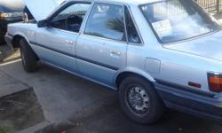 1990 blue Toyota Camry gas saver 4 cylinder runs good smog okay