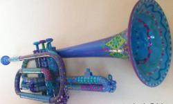 Below is our website. We do unique artwork from re-purposed instruments, although we welcome ANY custom orders. Our pieces are priced from around $100 to $1000. We also offer custom murals. An example can be seen on our Etsy site. This is the holiday
