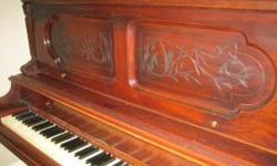 Beautiful, upright piano. Free to good home. Needs tuning. Two hammers came off (for black keys near the top and bottom of the board); may be reparable. One key is missing part of its ivory. Otherwise, it is fine, charming, and waiting to be played and