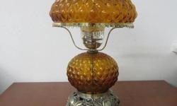 From an Estate.&nbsp; 19" TALL,&nbsp; BASE IS 7" WIDE on each side,&nbsp; TOP Globe is 10" WIDE on each side,&nbsp; BOTTOM Globe is 6.5" WIDE on each side.
Beautiful warm Gold/Bronze color glow.
Comes with additional frosted hurricane covers.&nbsp; By