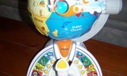 COST $160.00. LIKE NEW. WIRELESS JOYSTICK REMOTE CONTROL. 7 MODES OF PLAY. TEACHES BASIC FOREIGN LANGUAGE PHRASES. INTRODUCES CHILDREN TO WORLD GEOGRAPHY, PEOPLE, AND PLACES. 4 YRS AND UP. SEVEN FLIGHT MISSIONS AND MORE. LEARN ABOUT CONTINENTS, OCEONS,