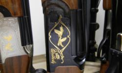 Weatherby Orion Italia NRA 2008 gun of the year. Number 0196 out of 1150. Unfired except factorty tested. Gold pheasants & ducks on other. --&nbsp;