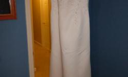 Never worn, beautiful strapless wedding gown, size 8, color off-white.
Please call 254-258-5244 for more details.