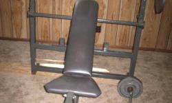 Make is Body Smith.&nbsp; Sturdy and excellent condition.&nbsp; Leg extension, Preacher Bar, Dips capacity,&nbsp; and military press.&nbsp; Paid $300.00 new.