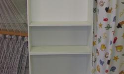 Nice white bookshelf unit with two adjustable shevles in very good condition. Measures 71 inches high by 20 inches wide by 11.5 inches deep.