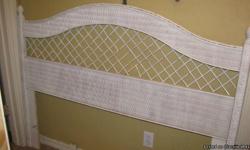 White wicker headboard. Fits full size bed. Cute for girls room. We have weaved ivy, flowers and ribbon through it for extra cuteness!