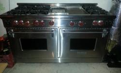 It's a stainless steel&nbsp;natural gas WOLF 60 inch&nbsp; side by side double oven complete with 6 gas ranges an inferred giddle and an inferred charbroiler. We bought it new in 2004 used it for 4 years and has been in storage ever since. Has 3 racks in