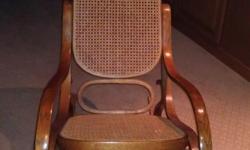 Wooden Rocking chair&nbsp;with cane back and seat. Great condition. Comes from pet and smoke free home. Cash only