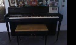 &nbsp;Piano is black and in very good condition. Kids have left home and we no longer have use for it.